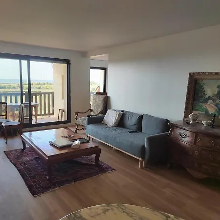 Charming Beachfront In